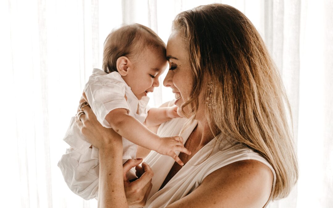 a woman enjoying her baby